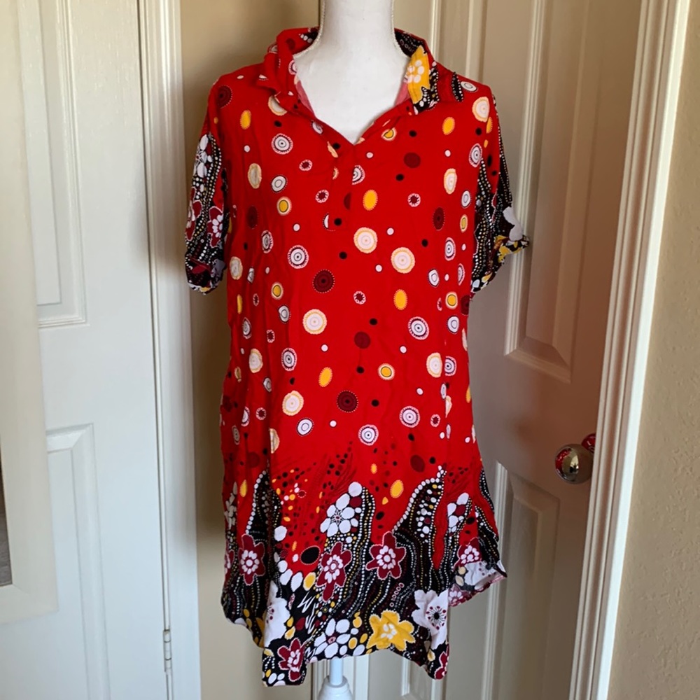 Red polka polo dress. Fits small to large.